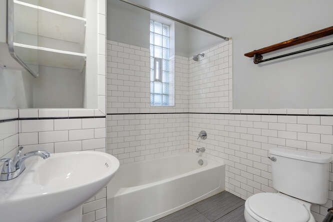Fully Renovated 7 Unit Investment Property In Pilsen - $1,125,000 6 2104 S Washtenaw Ave bathroom