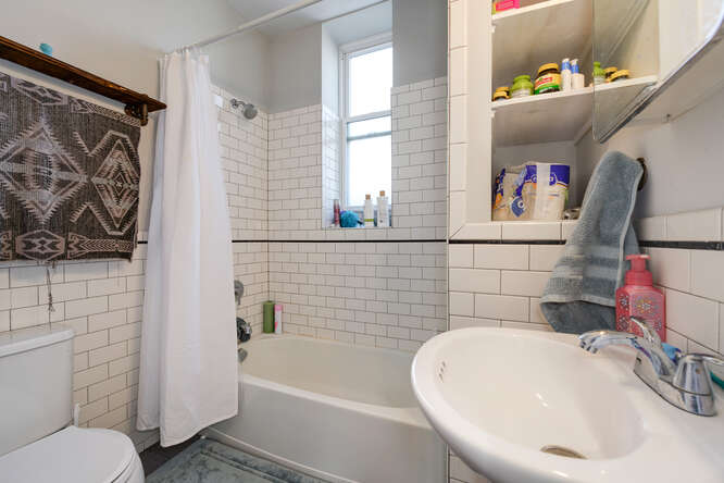 Fully Renovated 7 Unit Investment Property In Pilsen - $1,125,000 14 2104 S Washtenaw Ave bathroom
