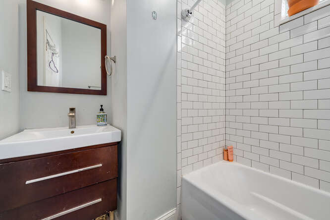 Fully Renovated 7 Unit Investment Property In Pilsen - $1,125,000 18 2104 S Washtenaw Ave bathroom