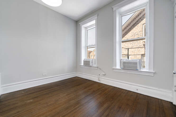 Fully Renovated 7 Unit Investment Property In Pilsen - $1,125,000 5 2104 S Washtenaw Ave bedroom
