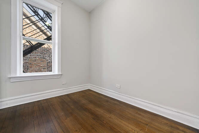 Fully Renovated 7 Unit Investment Property In Pilsen - $1,125,000 7 2104 S Washtenaw Ave bedroom