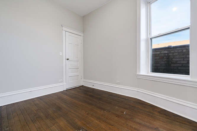 Fully Renovated 7 Unit Investment Property In Pilsen - $1,125,000 8 2104 S Washtenaw Ave bedroom