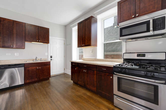 Fully Renovated 7 Unit Investment Property In Pilsen - $1,125,000 3 2104 S Washtenaw Ave kitchen