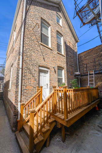 Fully Renovated 7 Unit Investment Property In Pilsen - $1,125,000 15 2104 S Washtenaw Ave rear exterior 1